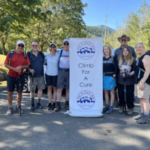 image of hikers with Climb For A Cure sign