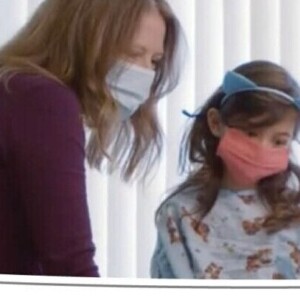 child with bunny ears